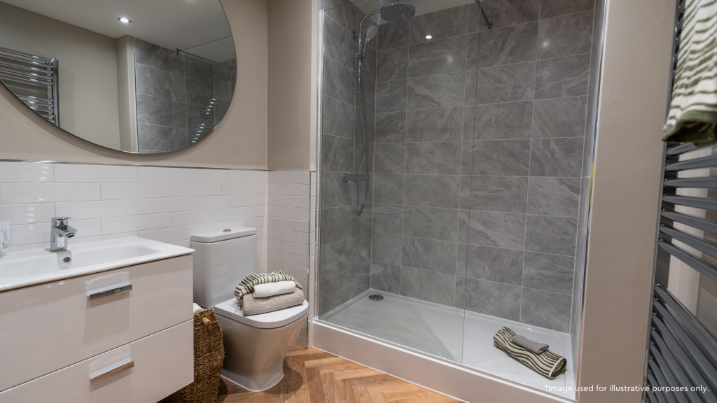 Grey bathroom with white facilities